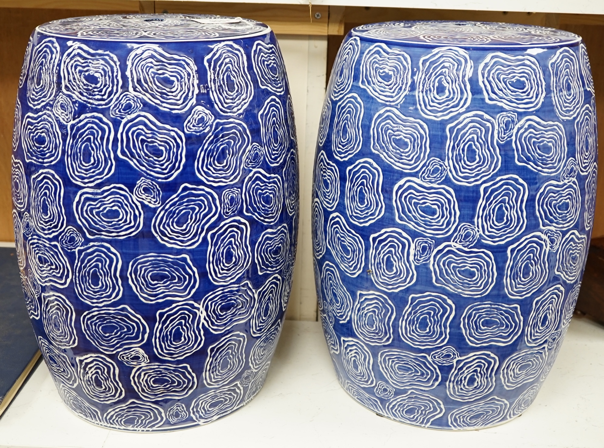 Two Chinese blue and white garden seats, 44cm high. Condition - good